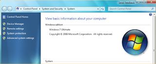 Windows 7 Device Manager and System panel from the Control Panel