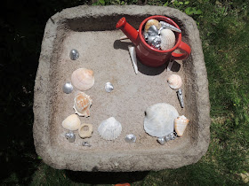 Sea shell bird bath