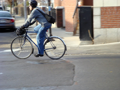 man commuting Boston bicycle bike