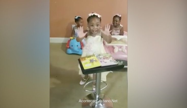 Niña de cuatro años predicando