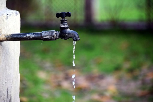 Save Water. Water tap and water drops