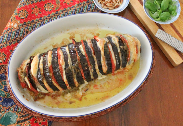 Food Lust People Love: Caprese Stuffed Roasted Eggplant is a showstopper of a main course, guaranteed to be loved by vegetarians and omnivores alike. After all, who can resist ripe tomatoes, flavorful basil pesto and melty mozzarella roasted in a hasselback-cut eggplant?