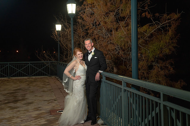 Night portrait of Bride and Groom with lamp nightlight Port Saint Lucie Civic Center Wedding Photos by Stuart Wedding Photographer Heather Houghton Photography