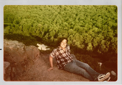 Teen-age leo sitting on the cliff of Porcupine Mountains