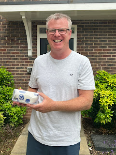 A smiling Andy Awford standing outside in a garden holding the cereal bowl that he and his friend Bill Leonard kindly went out of their way to arrange and collect for my dad who's an avid Pompey supporter and now has Alzheimer's after he broke his bowl and I put out a plea on facebook as I couldn't order a new one as the website was under maintenance