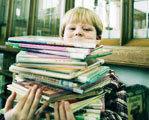 afbeelding van kind met boeken, overgenomen van website Crown van Gelder