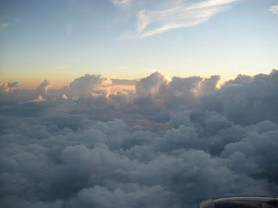 light fluffy clouds taken from an airplane