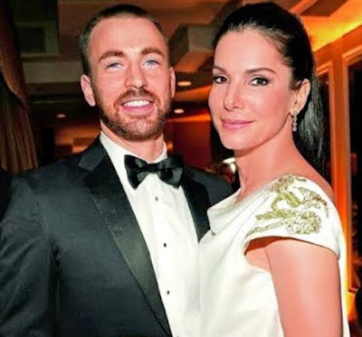 Chris Evans with Sandra Bullock