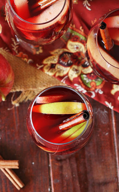 Top View of Apple Slices in a Glass of Autumn Apple Sangria Image