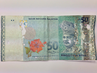 Berapa Nilai Duit Kertas Ringgit Malaysia Yang Rosak Dan Koyak Bila Ditukar Di Bank?