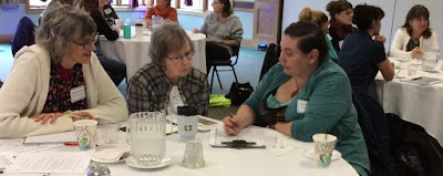 librarians at table talking