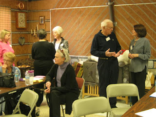 Several Friends socializing at the meeting