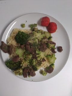 Beef and Broccoli with spaghetti and strawberries