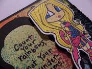 I then sprayed the paper with a few matching colors of Glimmer Mist and .