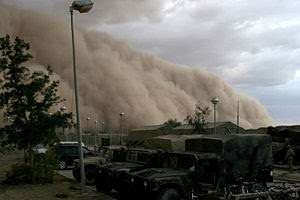 A huge cloud of dust rolls towards the photographer in this image of a dust storm in Iraq