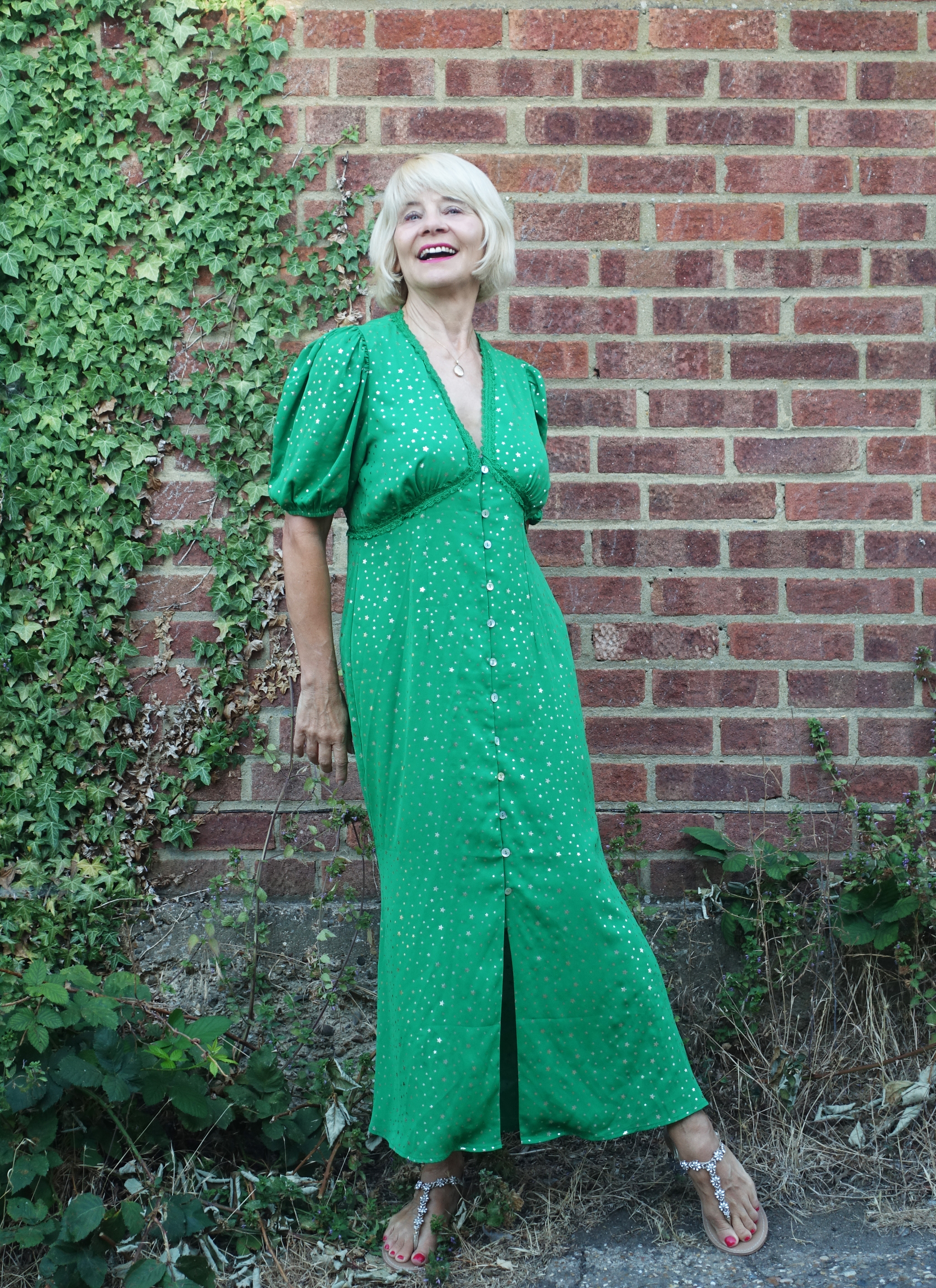 A silky green maxi dress with gold stars is the choice of Is This Mutton's Gail Hanlon in the August Style Not Age Challenge, Maxi Madness