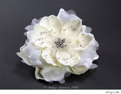  are carrying small posies instead of wearing the traditional corsage