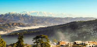 Himalayan states of India - Jammu & Kashmir, Himachal Pradesh adn Uttrakhand have seen heavy snowfall in the month of January (2014). Places like Srinagar, Pehalgam, Gulmarg Shimla, Manali, Dalhousie, Dhanachuli & Ranikhet got snow multiple times during the month. This Photo Journey shares some photographs from Ranikhet with a blanket of snow.Ranikhet is a hill station and cantonment town in Almora district in Uttrakhand state of Indian, which is situated around Himalayan ranges. Ranikhet has Military Hospital, Kumaon Regiment (KRC) and Naga Regiment, which are maintained by the Indian Army.  This beautiful town is placed at an altitude of 1800+ meters above sea level and one can see snow covered peaks of the Himalayas throughout the year. And during the winters, this town gets decent snowfall to make the environment more cheerful.Ranikhet town and areas around it becomes very cold in the winters and remains moderate in summers and is best enjoyed from March to October. Ranikhet gets snowfall in the winter season, mainly in the months of December, January and February. And in rest of the months the weather of Ranikhet remains pleasant. Visiting Ranikhet during summers is a must and at the same time an experience during winters is also recommneded.Ranikhet has a very special feel of hill station with adjoining cantonment area. Whole town is very well maintained and as you climb up, there is huge cantonment area with an army museum. Lush green hills of Ranikhet with some lovely views over the distant Himalaya make it more special. While you are walking on main road of Ranikhet, white Himalayas are always on one side. One of the focus in Ranikhet town is a busy market.Ranikhet hills are surrounded by high trees of pine, oak and deodar. Wildlife around ranikhet includes  leopard, leopard cat, mountain goat, barking deer, sambar, pine marten, Indian hare, red-faced monkey, jackal, langur & fox etc. Some of the colorful birds can also be found as you move to the peaceful places around Ranikhet.If you are in Ranikhet during Apple season, you may also want to visit some of the apple orchards around the place, which is very unique experience.When I think about Ranikhet, the peaceful walks come to my mind apart from a military museum and beautiful views of snow covered Himalayan peaks. Although there are few more attractions have been discovered and marketed in last few years. And that's the good part that you have nothing much to do in the town and you get lot of time at peace. You can find some heritage properties around Ranikhet at reasonable rates and negotiation is quite easy in other hotels as well. Ensure that you plan it better.