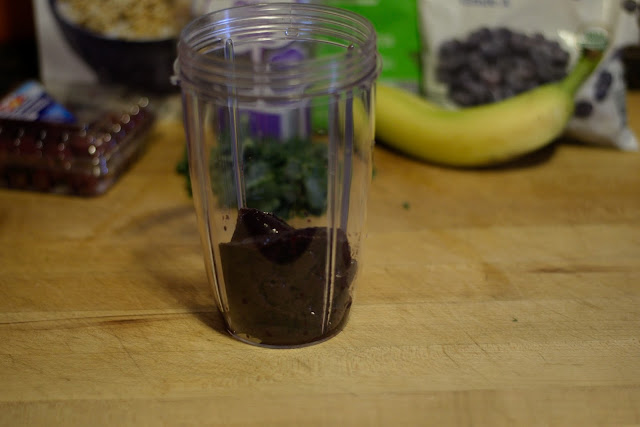 The acai puree placed into the blender.