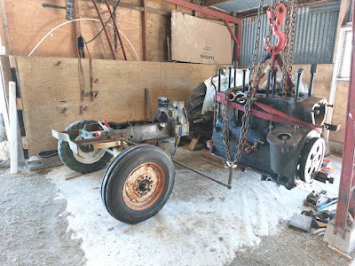 Engine hoisted after removal from David Brwon tractor