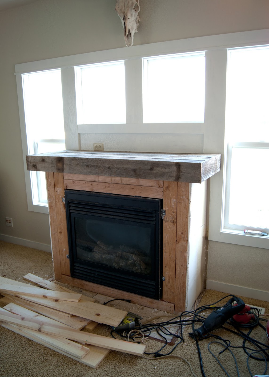 Before adding planks + reclaimed wood mantel - Fireplace Makeover