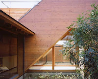 Japanese Wood-Clad House Design With Multi-Level Decks