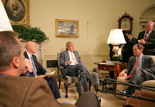 President George W. Bush discussed the economy with the press Friday, Oct. 5, 2007, in the Oval Office. Pictured with the President are, from left: OMB Director Jim Nussle, CEA Chairman Ed Lazear and NEC Director Al Hubbard. 'I want to thank members of my economic team for coming in the Oval Office this morning to bring some good news here for America's families and America's working people. The -- last month our economy added 110,000 new jobs,' said President Bush. 'And that's good news for people here in our country. It's an indicator that this economy is a vibrant and strong economy.' White House photo by Eric Draper.