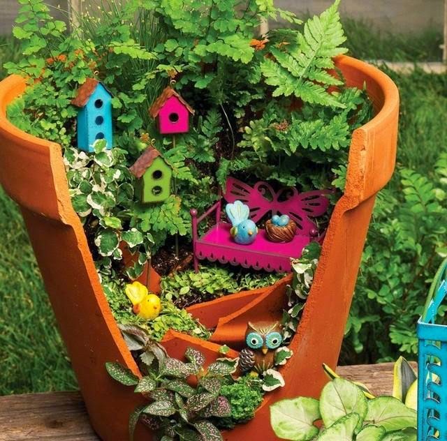 small garden design ideas: old flower pot with creative decorating