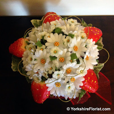  red strawberries and white daisies wedding posy