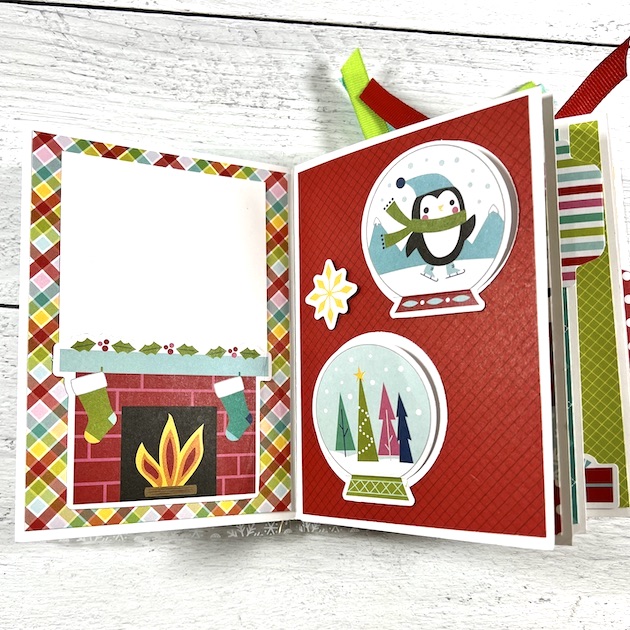 Christmas Scrapbook Album Page with fireplace and snowglobes