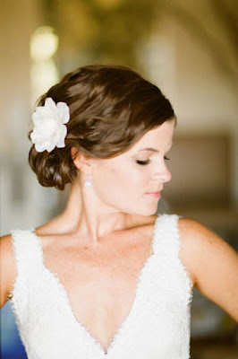 Curly Updo With A Side Flower