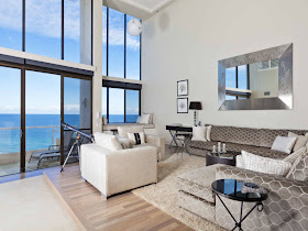 Two-floor glass wall with the ocean view