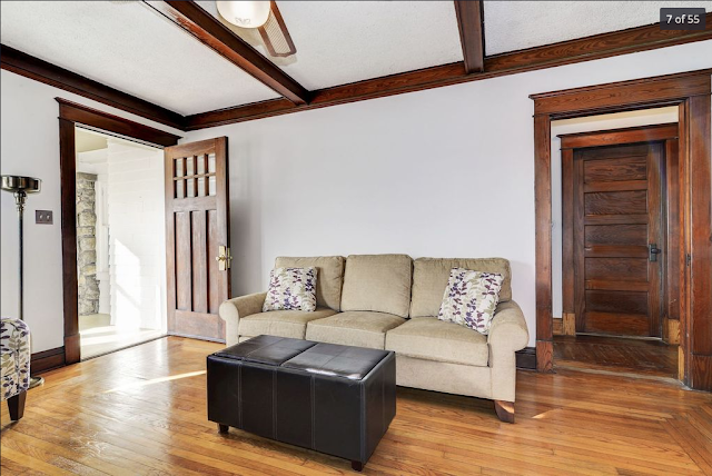 color image of living room, front door, side hall, and interior door of Sears Argyle • 7 Seal Street, High Bridge, New Jersey