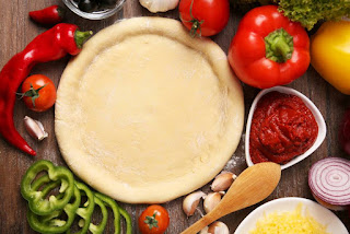 طريقة عمل عجينة البيتزا الإيطالي