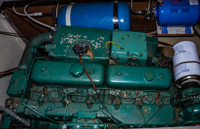 Photo of the old calorifier fixed to the inside of the hull alongside the starboard engine