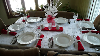 The Christmas dinner table set