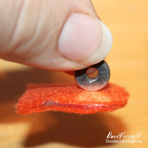Let the hot glue cool completely, trim off any excess hot glue, as desired.   Then test out the fish with the magnet and make sure it sticks!
