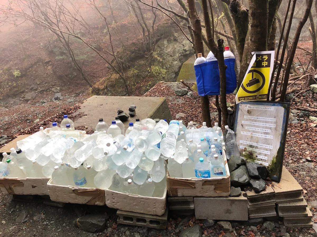 Plastic bottles with water for volunteers to carry