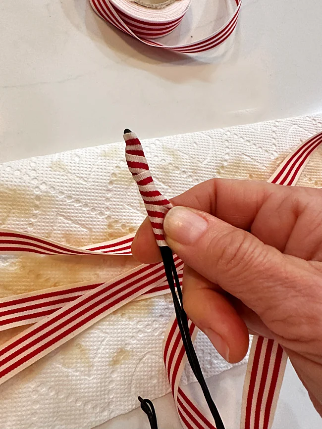 wrapping ribbon around wire