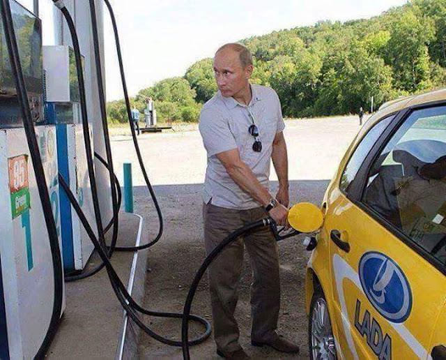Russian President Vladimir Putin filling his own tank