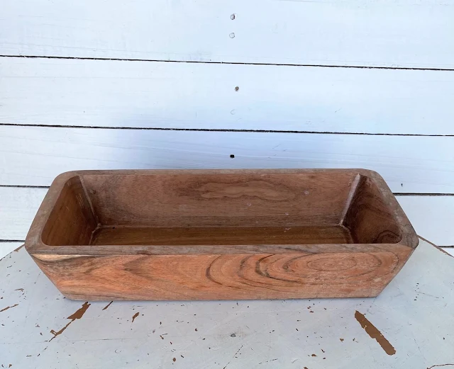 Photo of a heavy wooden rectangular bowl from the thrift shop.