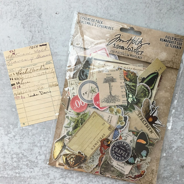 The "Field Notes" ephedra pack from Tim Holtz and the vintage library card that started it all.