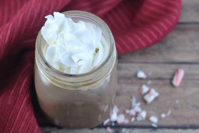 This pepermint mocha recipe is a skinny version of your favorite coffee house drink.  This skinny coffee drinks can be made with your choice of milk and sweetener.  This skinny peppermint mocha recipe can be made in about 10 minutes at home with no special equipment.  This diet coffee drink has fewer calories, fat, and carbs versus buying the drink at the popular chain.  Healthy coffee drinks can still be yummy!  #peppermintmocha #coffee #skinnycoffee #coffeedrink #peppermintcoffee