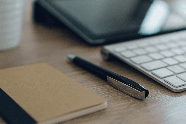 Wooden Desk Work Table with a Pen