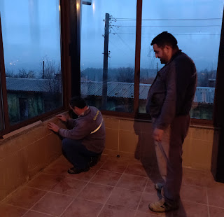 Bekir checking the tile positioning