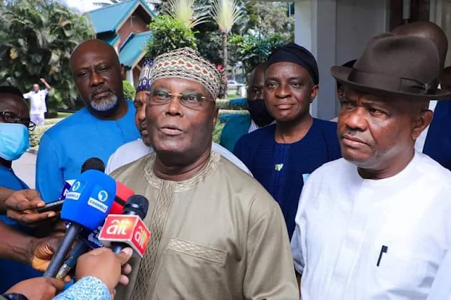 Alt: = "Atiku Abubakar with Nyesom Wike and group of others addressing journalists in Port Harcourt"