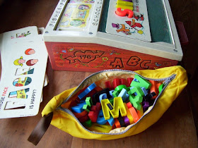 The letter magnets are too big letter magnets. The letter magnets are too big
