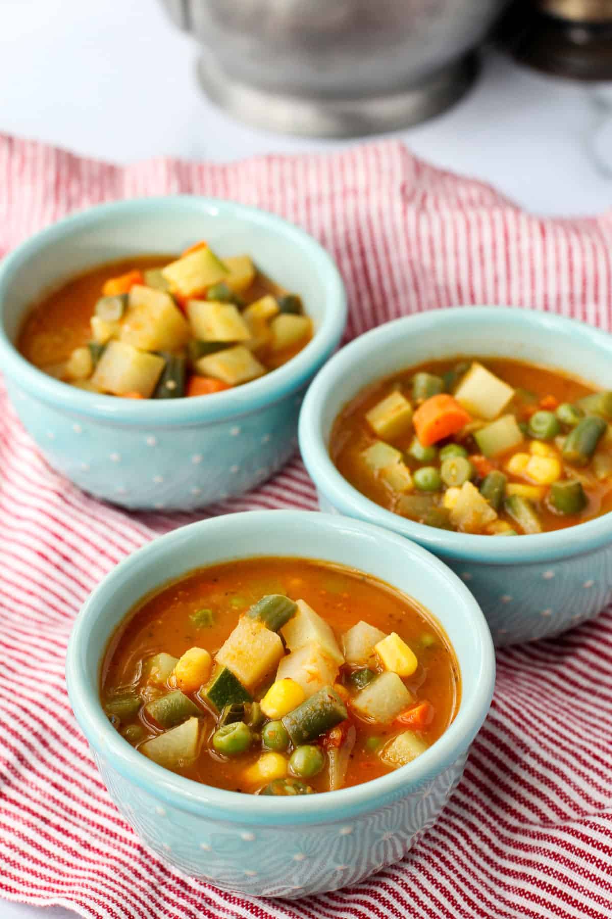 Mexican Vegetable Soup with Chipotles in bowls.