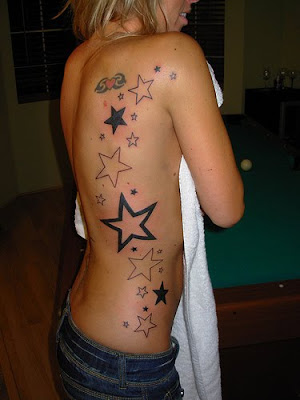 star tattoos for girls. Star Tattoos On Side Of Torso.