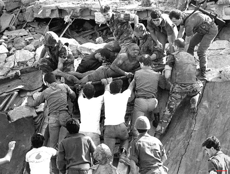 36 Amazing Historical Pictures. #9 Is Unbelievable - Oct.23,1983,a suicide truck-bombing at Beirut International Airport in Lebanon killed 241 U.S. Marines and sailors;a near-simultaneous attack on French forces killed 58 paratroopers.British soldiers give a 